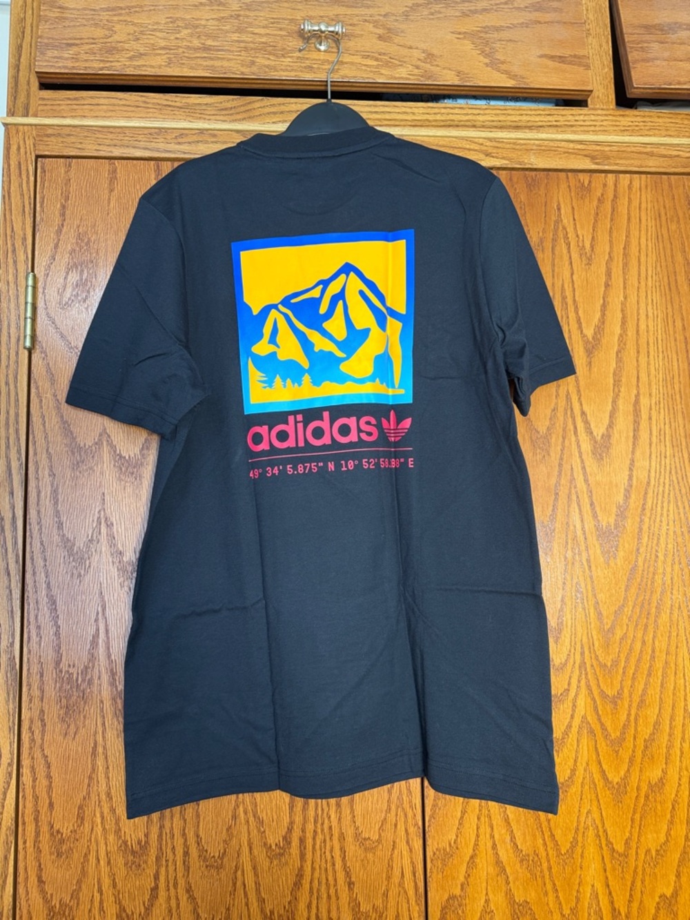 adidas Black Short-Sleeve Tee with Small Multicolor Patch